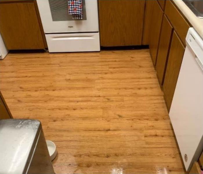 Flooded home with hard wood floor